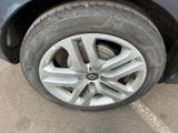 a close up of a tire on a car ' s rim