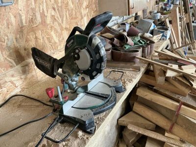 a picture of a circular saw on a table in a workshop