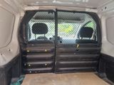 a white van with two doors open and a window open