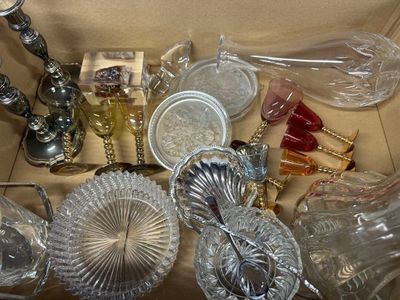 a box full of glass items sitting on a table