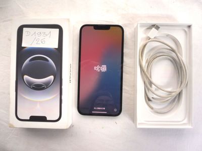 two iphones that are sitting in a box on a table
