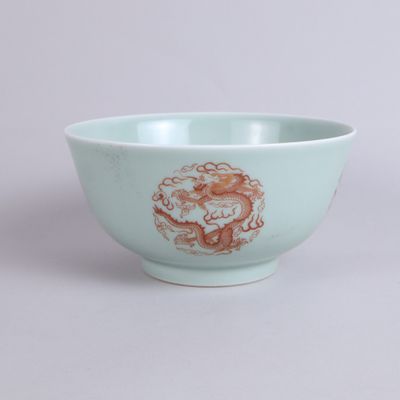 a small bowl with a design on the side