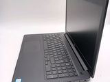 a laptop that is sitting on a white table