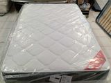 a mattress that is sitting on the floor in the store
