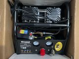 an open box with a compressor in it sitting on top of a floor