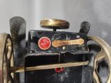 a close up of a sewing machine on a table