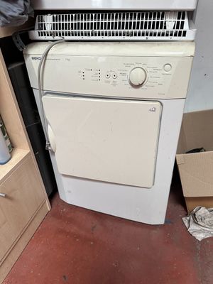 a white washer and dryer sitting next to each other