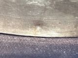 a close up of a knife on a table