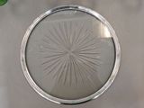 a glass plate with a starburst design on it