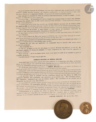 a close up of a piece of paper with a coin on it