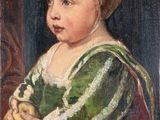 portrait of a young girl in a green dress holding an apple