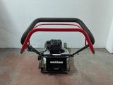 a small machine that is sitting on the floor