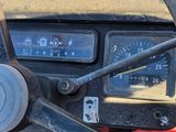 a steering wheel and dashboard of an old truck