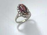 a close up of a ring on a white surface
