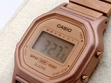 a close up of a digital watch on a napkin