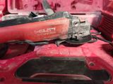 a red tool sitting on top of a red box