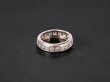 an 18k white gold and diamond eternity ring