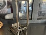 a basket that is sitting on a table in front of a window
