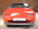 an image of a red sports car parked in a garage