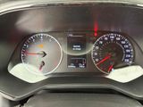 a close up of a car dashboard with a speedometer and gauges