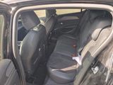 a car that has a seat in the back of it