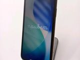 an image of a close up of a cell phone on a stand
