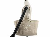 chanel canvas tote bag with black leather handles