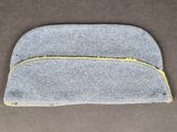 a close up of a blue and yellow zippered pouch on a brown surface