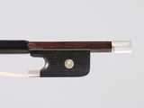 the bow is made of wood and has a black handle