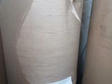 a close up of a roll of paper with a tag on it