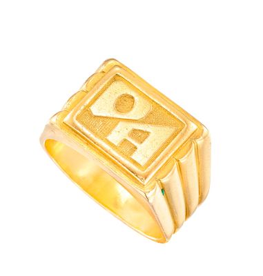 un gros plan d'une bague en or ornée d'un symbole ankh