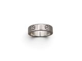 a close up of a ring on a white surface