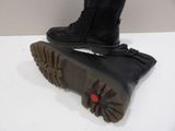 pair of black leather boots with zippers on top of them