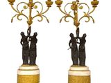 pair of bronze and marble candelabs with figures on marble bases