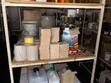 a shelf with many items on it in a room