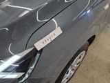 a close up of a car with a sticker on the front of it