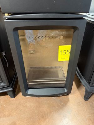 a stove that has a glass door on top of it