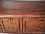 an image of a wooden cabinet with two doors and a drawer