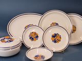 a group of plates and bowls on a table