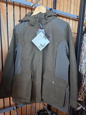 the jacket is hanging on the rack in the store