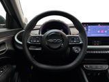 the interior of a car with a steering wheel and dashboard controls