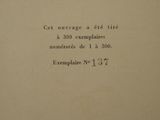 a close up of a book with a black and white image of a cat