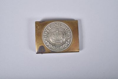 l'image d'une petite pièce d'argent sur une surface blanche