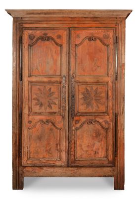 an old wooden cabinet with two doors and two drawers
