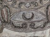 a drawing of a bird sitting on top of a plate