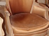 a chair that is sitting in the corner of a room