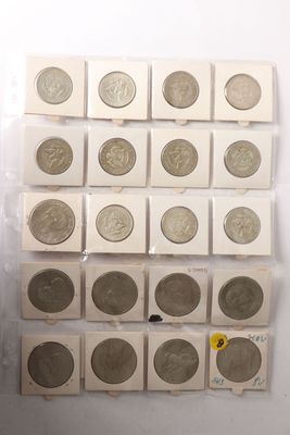 a lot of coins that are sitting on a table