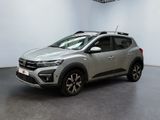 a silver suv parked in a garage with a roof rack
