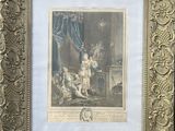 tableau encadré représentant un homme et une femme dans une pièce