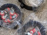 four rolls of candy wrapped in plastic bags on the floor